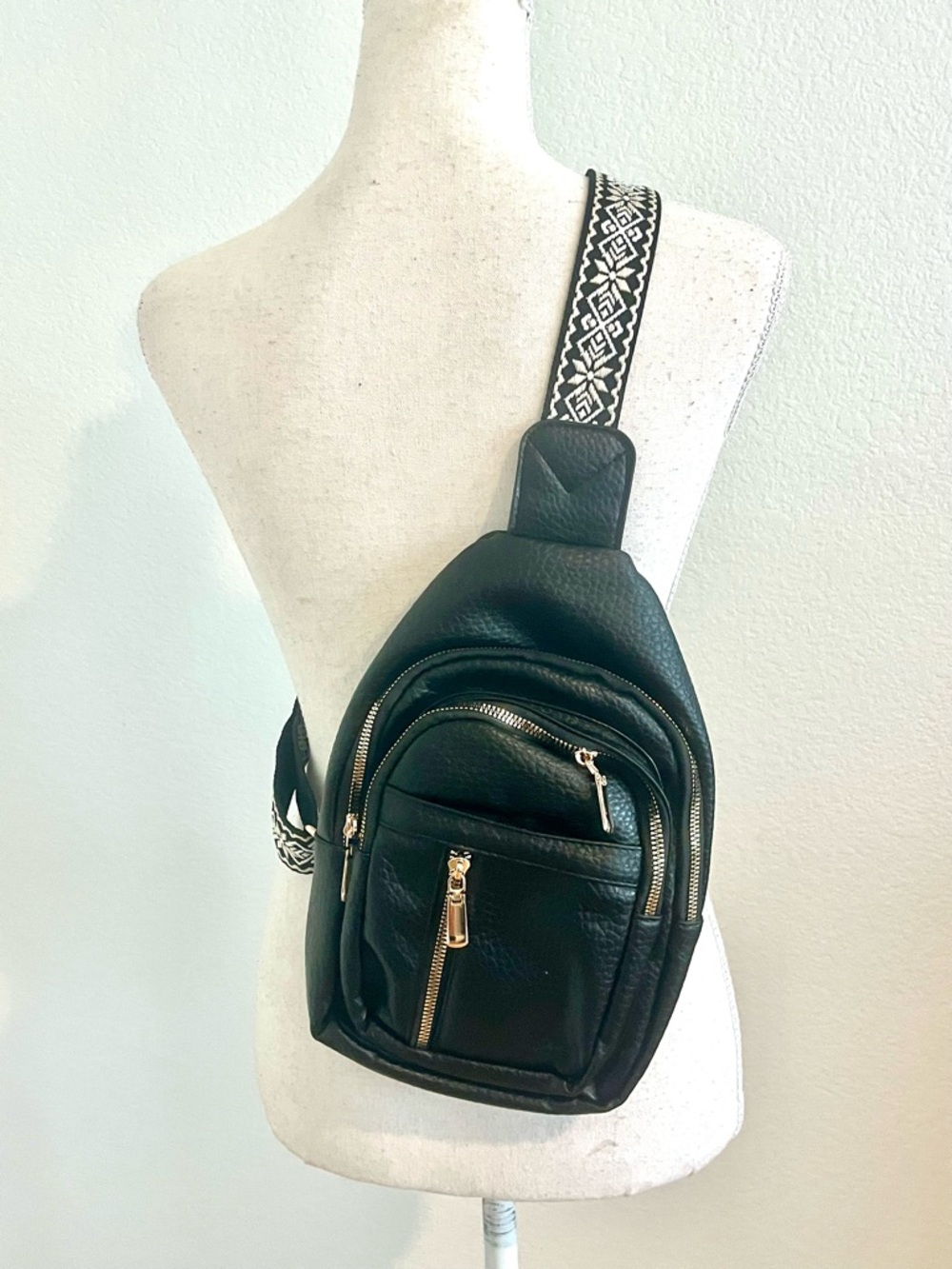 Black Crossbody Sling Backpack Bag with Patterned Strap